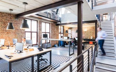 pexels-photo-2451566-2451566 Spacious and stylish open-plan office with loft and industrial aesthetic.